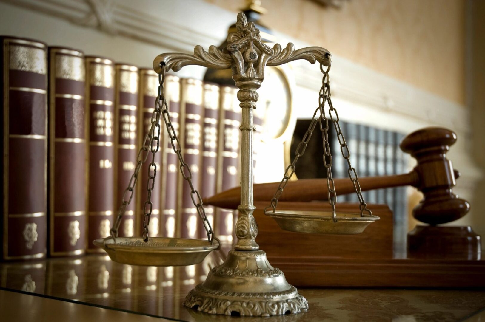 A close up of the scales of justice on top of a table